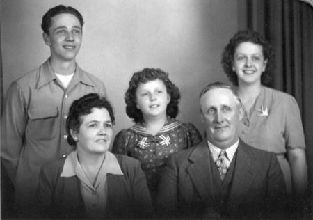 Photograph of Arthur Bell family - Arthur Sr., Edith, Arthur Jr., Charlotte Bell.