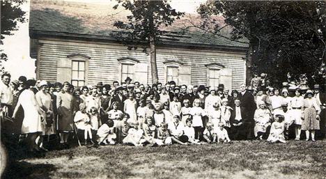 Picture of Group in front of Fairview Church for dedication reunion.